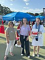 250626_Jobbarbecue Three women in front of the university stand on the Job Barbecue Square