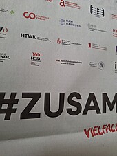 Ausschnitt der ZEIT-Kampagne #Zusammenland mit HWG LU-Logo